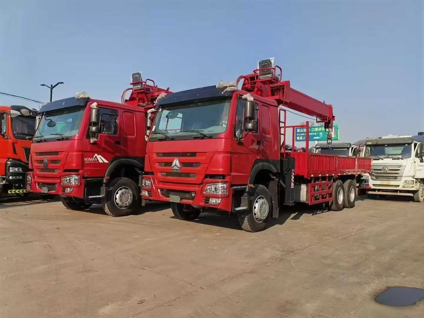Howo 10-wheel 6x4 truck-mounted crane equipped with 10-14 tons used vehicle for sale